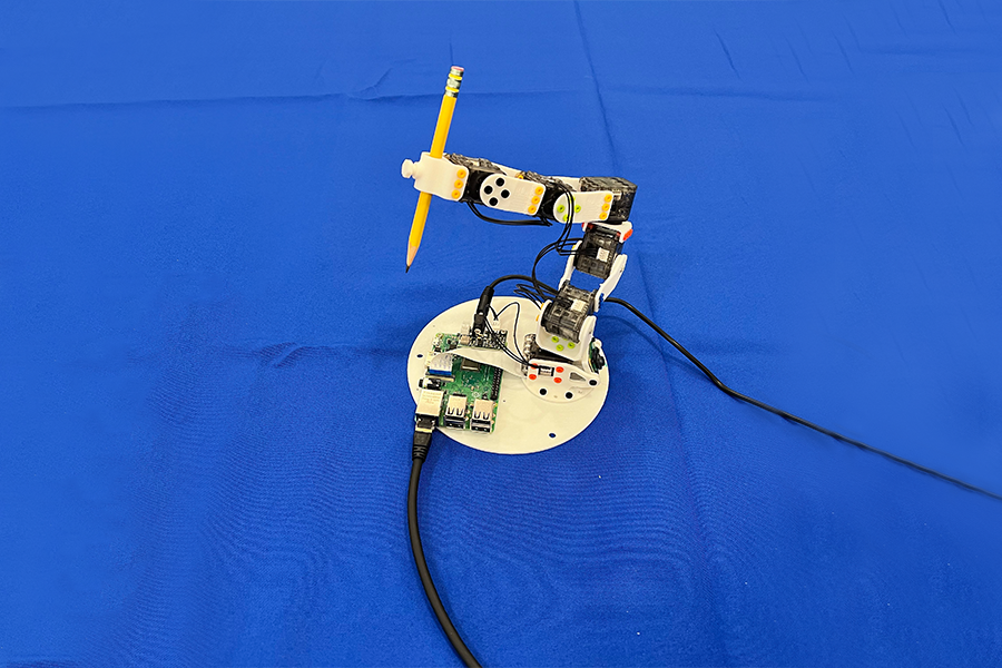 A robotic arm learns to understand its own body (Credit: Courtesy of the researchers).